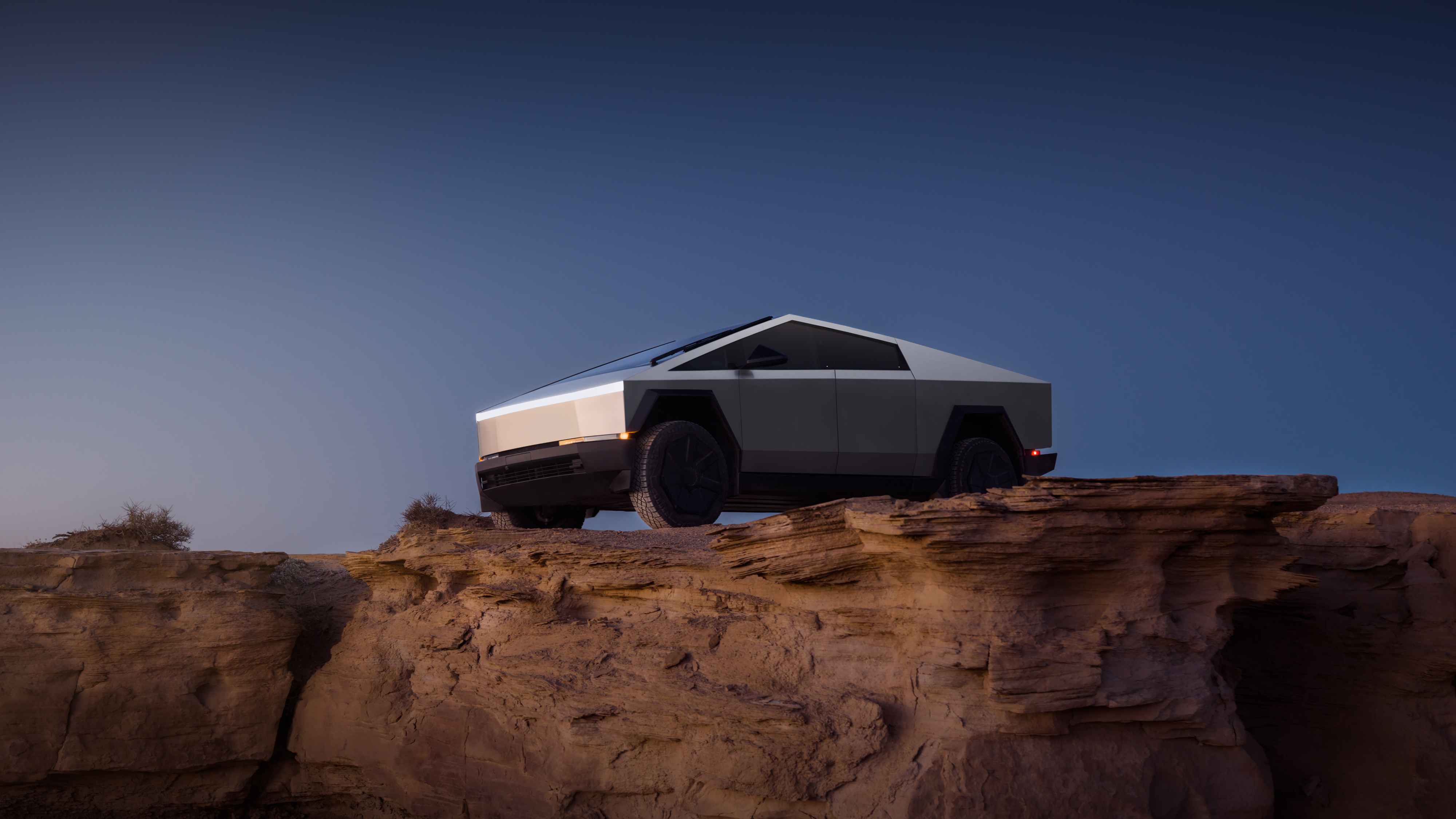 Tesla Cybertruck viewed from the side on a road